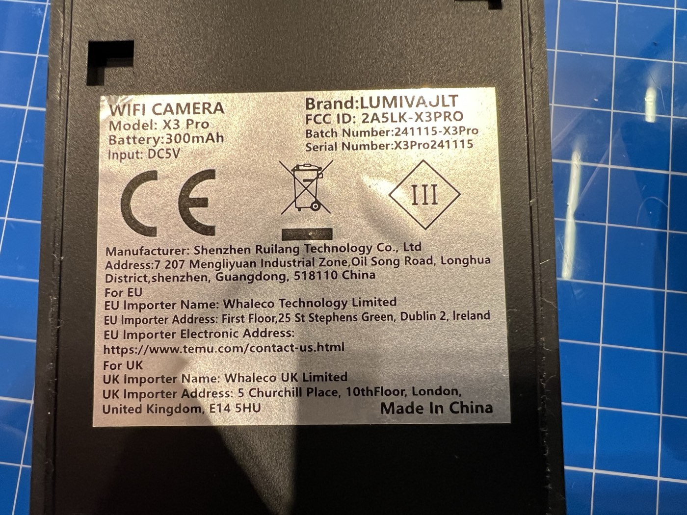 The label on the back of the unit listing FCC ID, manufacturer, importers and batch identifiers